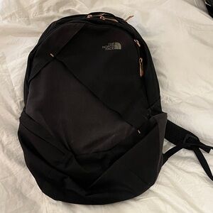 The North Face Black Backpack with Tan Accents